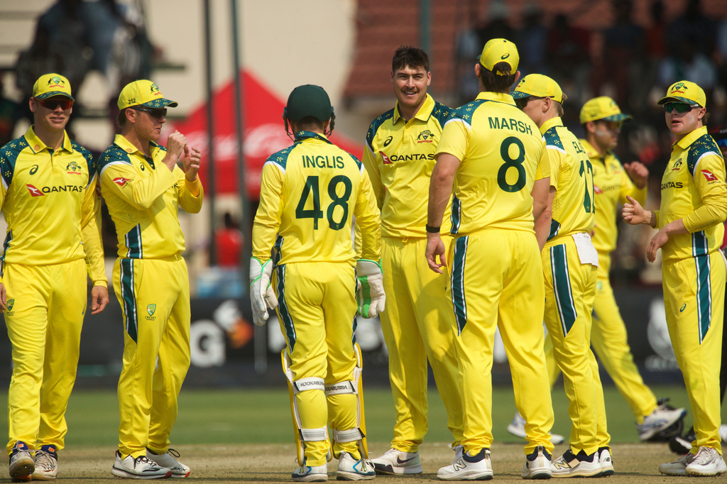 Australia's bowler Matt Renshaw, center, celebrates a wicket with teammates during a second one day international cricket match between Zimbabwe and Australia in Harare, Zimbabwe, Friday, Sept.18, 2026. (AP Photo/Wonder Mashura)