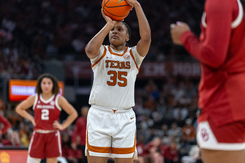 Texas forward Madison Booker (35) prepares to shoot a free-throw against Oklahoma during the second half of an NCAA college basketball game Sunday, Feb. 1, 2026, in Austin, Texas. (AP Photo/Stephen Spillman)