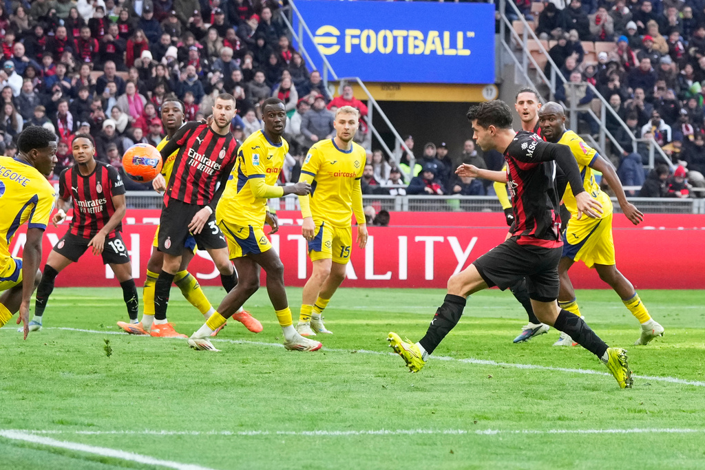 AC Milan's Christian Pulisic scores his side's first goal during a Serie A soccer match between AC Milan and Hellas Verona, in Milan, Italy, Sunday, Dec. 28, 2025. (AP Photo/Luca Bruno)