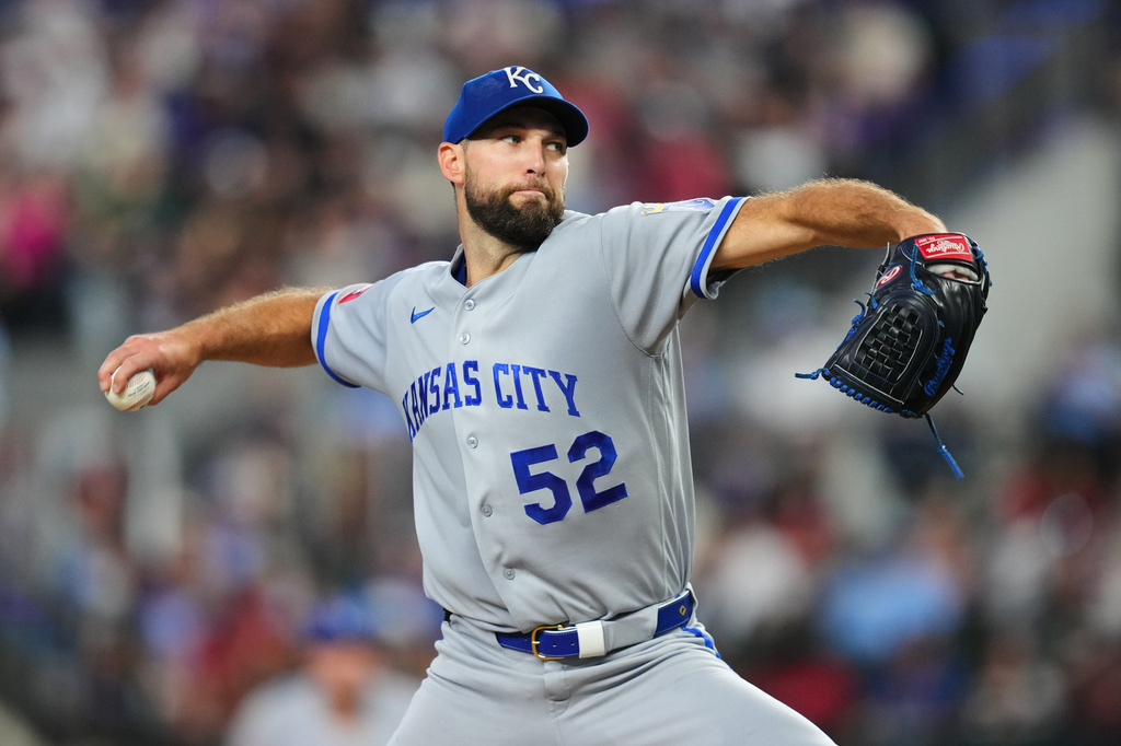Kansas City Royals starting pitcher Michael Wacha throws to the Texas Rangers during the third inning of a baseball game Sunday, May 31, 2026, in Arlington. (AP Photo/Julio Cortez)