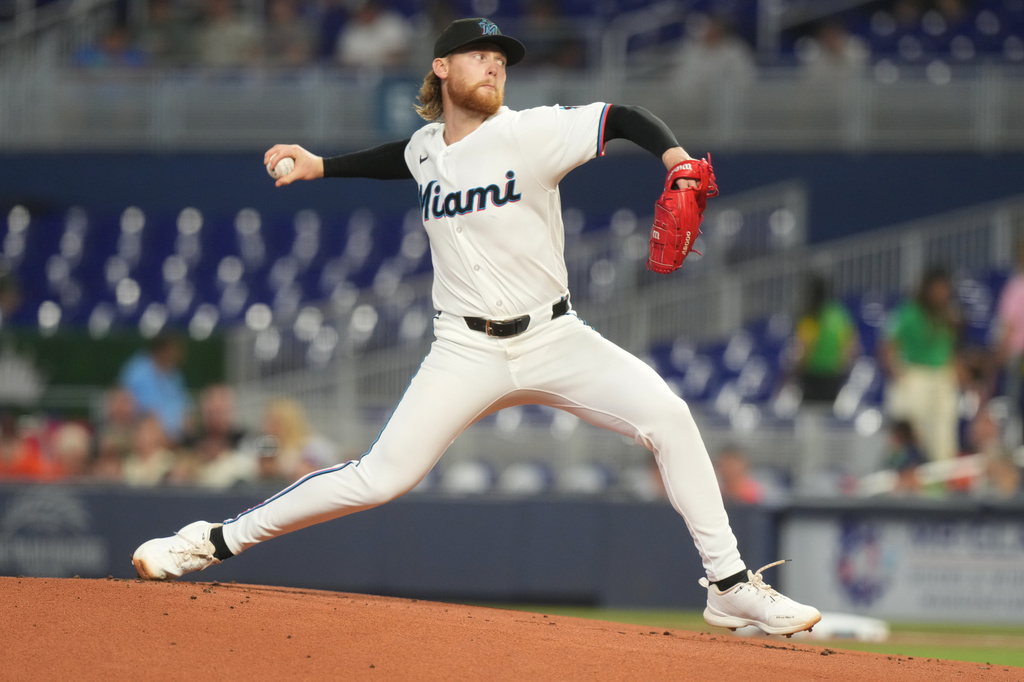 Miami Marlins pitcher Max Meyer aims a pitch during the first inning of a baseball game against the Baltimore Orioles Thursday, May 7, 2026, in Miami. (AP Photo/Marta Lavandier)