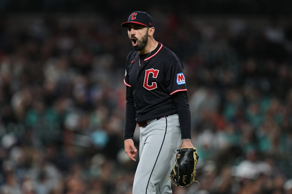 Cleveland Guardians pitcher Colin Holderman reacts to the final out against the Detroit Tigers during the nintth inning of a baseball game Wednesday, May 20, 2026, in Detroit. (AP Photo/Paul Sancya)