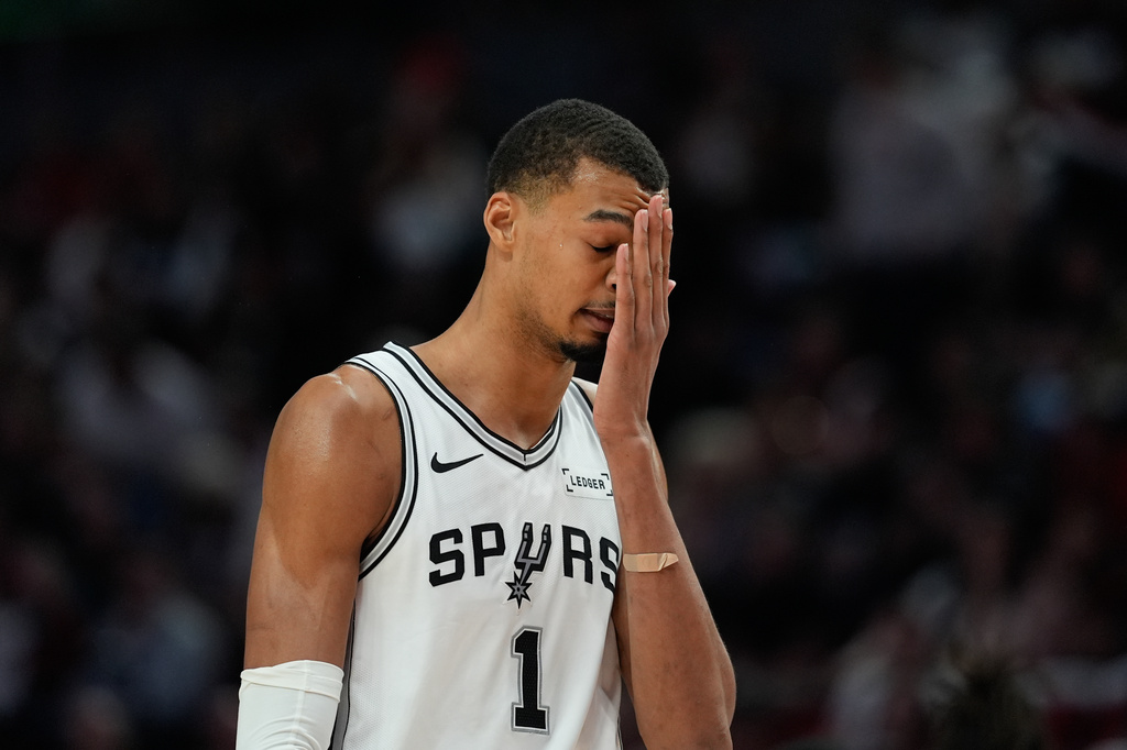 San Antonio Spurs forward/center Victor Wembanyama (1) reacts after a play during the second half in Game 4 of a first-round NBA basketball playoffs series against the Portland Trail Blazers, in Portland, Ore., Sunday, April 26, 2026. (AP Photo/Jenny Kane)