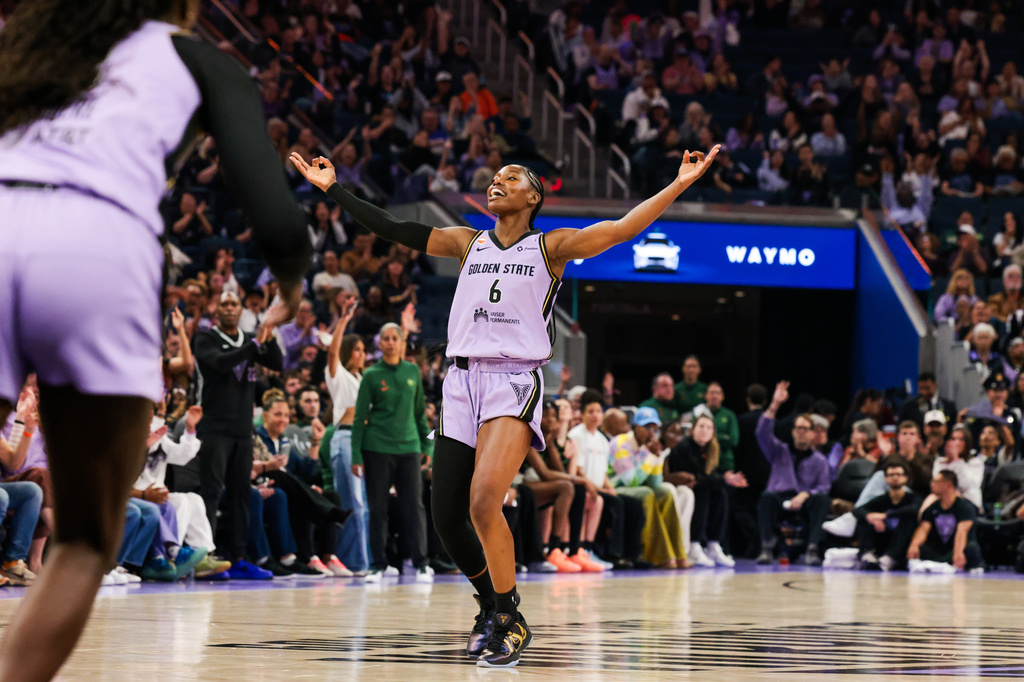 Golden State Valkyries guard/forward Kaila Charles (6) raises her arms after scoring a 3-pointer during a face off against the Seattle Storm during a WNBA basketball game in San Francisco, Saturday, Sept. 19, 2026. (Yalonda M. James/San Francisco Chronicle via AP)