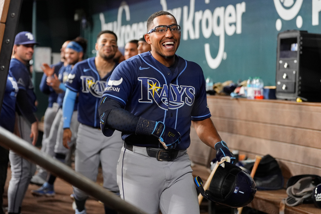 Tampa Bay Rays' Richie Palacios celebrates his solo home run with the team during the fourth inning of a baseball game against the Texas Rangers Friday, Sept. 4, 2026, in Arlington, Texas. (AP Photo/Tony Gutierrez)