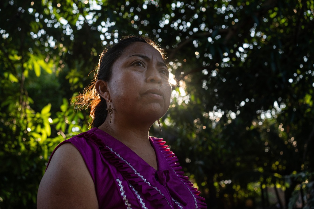 Teacher and activist Maribel Cervantes observes her garden in San Juan Volador, Mexico, Oct. 27, 2025. (AP Photo/Felix Marquez)