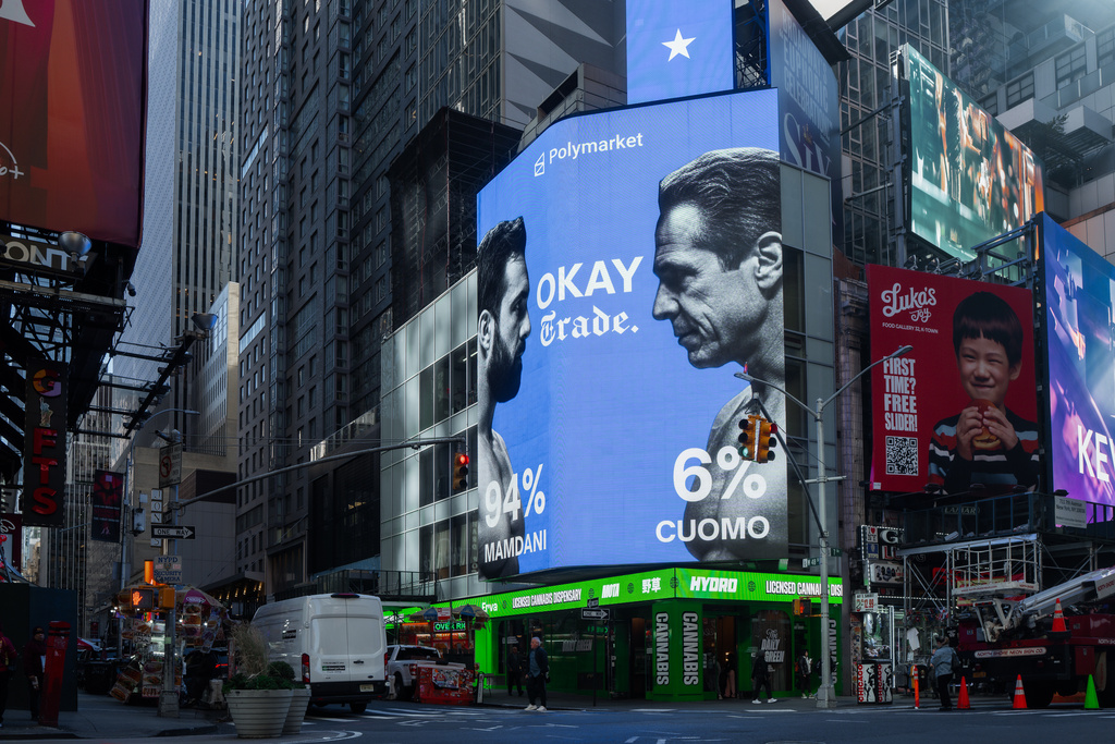 Advertisements by the American company Polymarket predict a victory for Zohran Mamdani in the New York City mayoral election on Tuesday, Nov. 4, 2025, in New York. (AP Photo/Olga Fedorova)