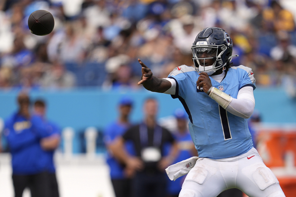 Tennessee Titans quarterback Cam Ward passes during the second half of an NFL football game against the Los Angeles Rams, Sunday, Sept. 14, 2025, in Nashville, Tenn. (AP Photo/George Walker IV)