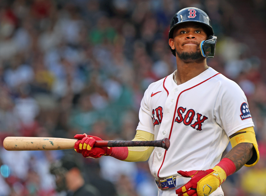 Boston Red Sox centerfielder Ceddanne Rafaela raects after striking out in the fifth inning of a baseball game against the Athletics, Saturday, Aug. 8, 2026 in Boston. (AP Photo/Jim Davis)
