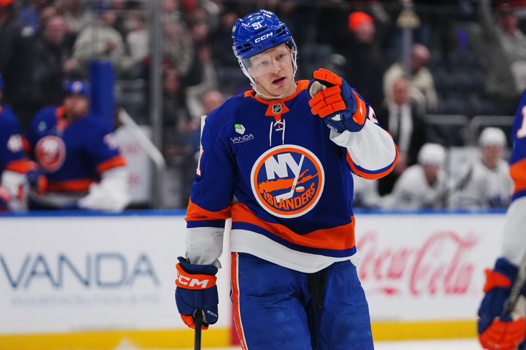 New York Islanders' Emil Heineman (51) celebrates after scoring a goal during the second period of an NHL hockey game against the Toronto Maple Leafs Thursday, April 9, 2026, in Elmont, N.Y. (AP Photo/Frank Franklin II)