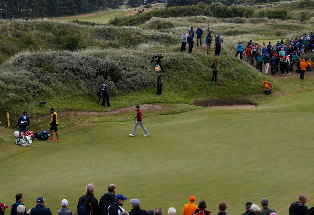 FILE - Jordan Spieth of the United States walks off the 2nd hole during the second round of the British Open Golf Championship, at Royal Birkdale, Southport, England, Friday July 21, 2017. (AP Photo/Alastair Grant, File)