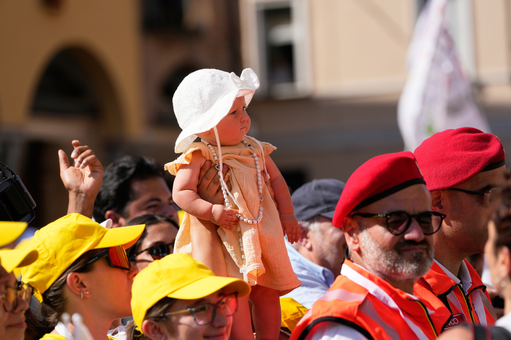 Pope Leo XIV prays in front of the relics of St. Augustine as he visits the San Pietro in Ciel d'Oro Basilica in Pavia, northern Italy, Saturday, June 20, 2026. (AP Photo/Luca Bruno)