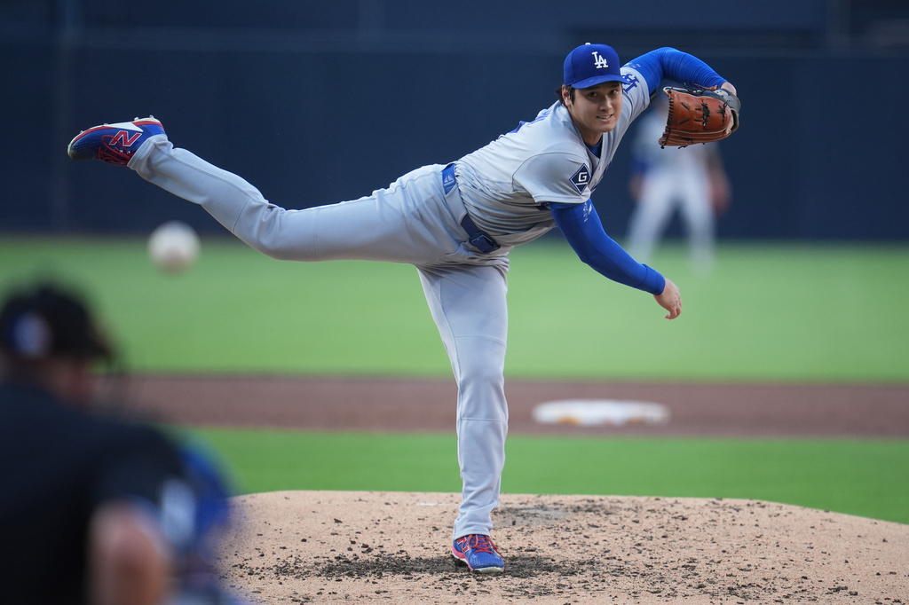 Los Angeles Dodgers starting pitcher Shohei Ohtani works against a San Diego Padres batter during the third inning of a baseball game Wednesday, May 20, 2026, in San Diego. (AP Photo/Gregory Bull)