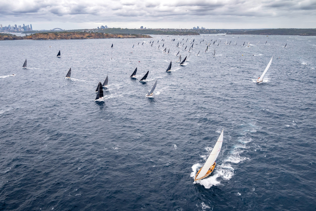 In this photo provided by the Cruising Yacht Club of Australia, competitors make a start in the Sydney Hobart yacht race in Sydney, Friday, Dec. 26, 2025. (Kurt Arrigo/CYCA via AP)