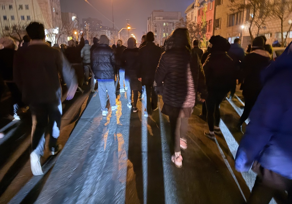 In this photo obtained by The Associated Press, Iranians attend an anti-government protest in Tehran, Iran, Thursday, Jan. 8, 2026. (UGC via AP)