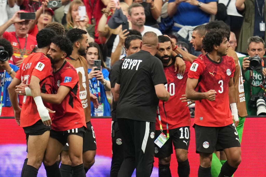 Egypt players celebrate after Mohamed Salah (10) scored his side's second goal during the World Cup Group G soccer match between New Zealand and Egypt in Vancouver, British Columbia, Sunday, June 21, 2026. (AP Photo/Abbie Parr)
