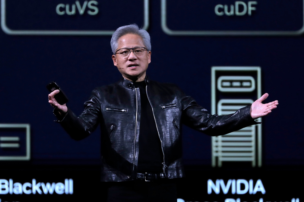 Nvidia CEO Jensen Huang delivers a speech during the Computex 2026 exhibition in Taipei, Taiwan, Monday, June 1, 2026. (AP Photo/Chiang Ying-ying)