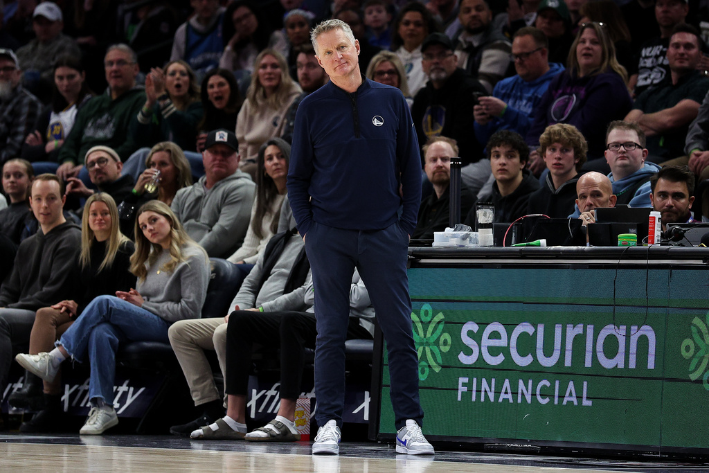 Golden State Warriors head coach Steve Kerr reacts during the first half of an NBA basketball game against the Minnesota Timberwolves, Sunday, Jan. 25, 2026, in Minneapolis. (AP Photo/Matt Krohn)
