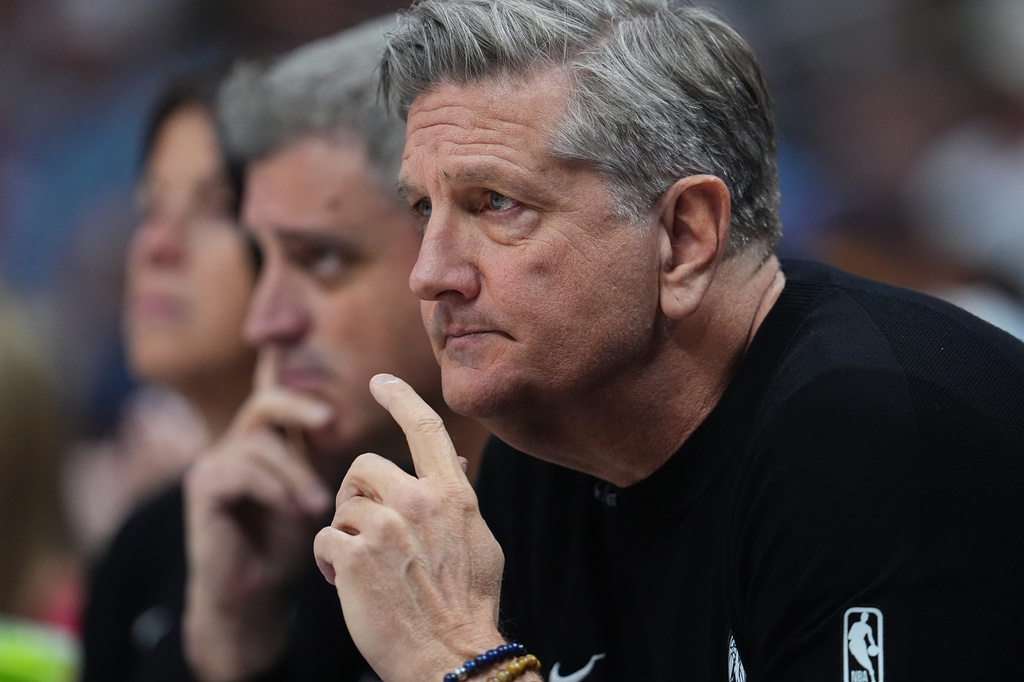 Minnesota Timberwolves head coach Chris Finch looks on in the first half in Game 1 of a first-round NBA playoffs basketball series against the Denver Nuggets Saturday, April 18, 2026, in Denver. (AP Photo/David Zalubowski)