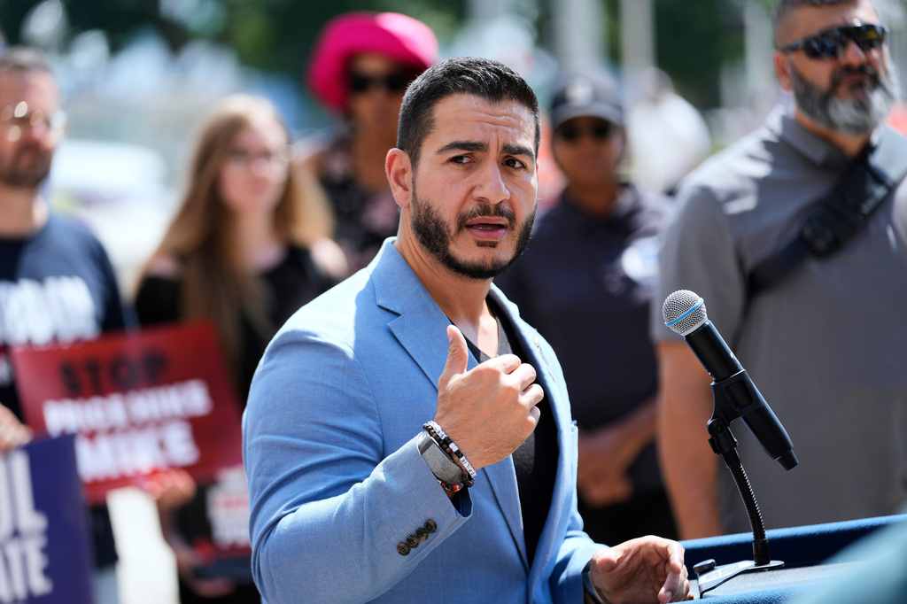 Democratic nominee for U.S. Senate Abdul El-Sayed speaks at a news conference at the base of the Spirit of Detroit monument in Detroit, Wednesday, Aug. 19, 2026. (AP Photo/Paul Sancya)
