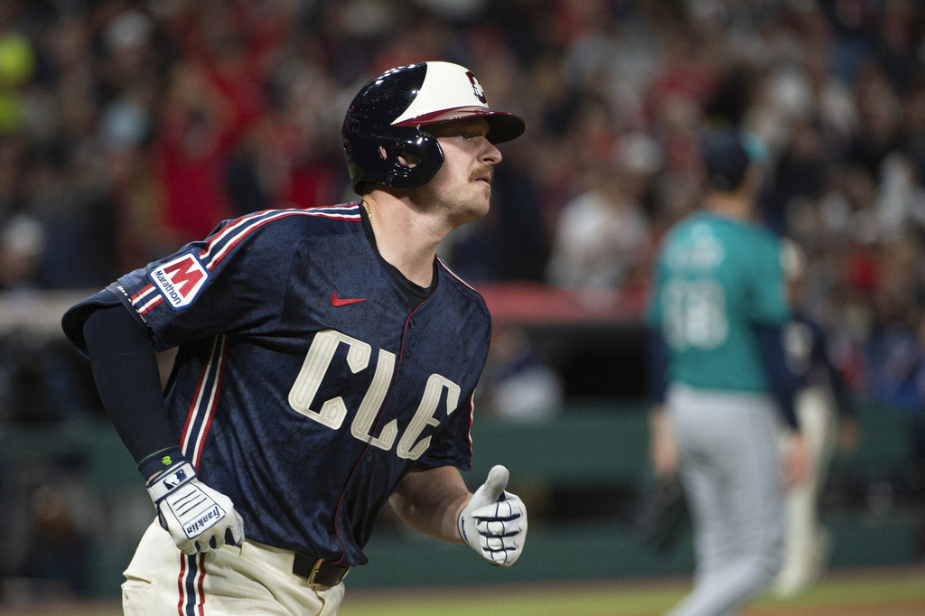 Cleveland Guardians' Kyle Manzardo rounds the bases after hitting a solo home run off Seattle Mariners starting pitcher George Kirby during the sixth inning of a baseball game, Friday, Aug. 29, 2025, in Cleveland. (AP Photo/Phil Long)