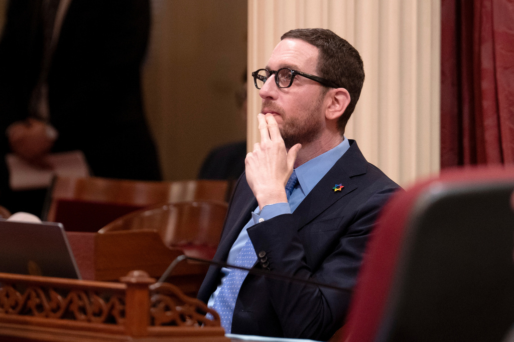 FILE - State Sen. Scott Wiener, D-San Francisco, chairman of the Senate Budget and Fiscal Review Committee, watches as the Senate votes on measure to reduce the state budget deficit at the Capitol in Sacramento, Calif., Thursday,, April 11, 2024.(AP Photo/Rich Pedroncelli, file)