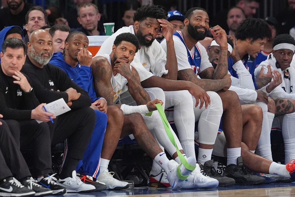 Most of the starting line-up for the Philadelphia 76ers watches from the bench during the second half of Game 1 in a second-round NBA basketball playoffs series against the New York Knicks Monday, May 4, 2026, in New York. (AP Photo/Seth Wenig)
