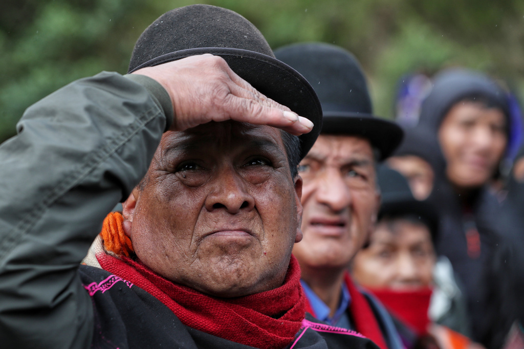 Misak Indigenous guards patrol after deadly clashes with the Nasa community over a land dispute in Silvia, Colombia, Friday, May 22, 2026.(AP Photo/Santiago Saldarriaga)