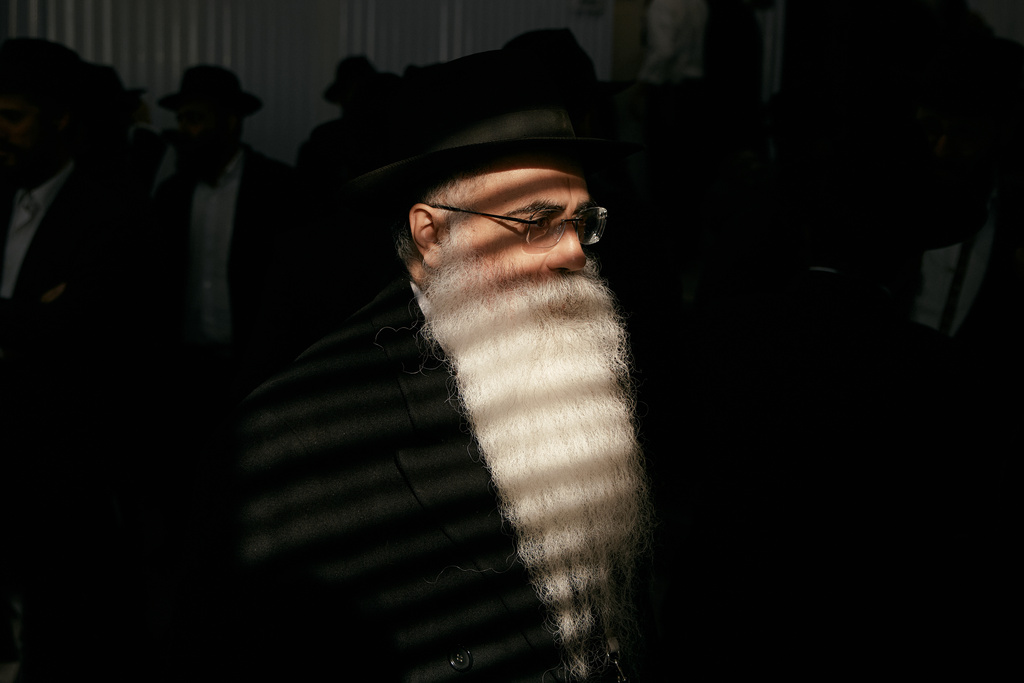 Chabad-Lubavitch rabbis gather at the resting place of the Rebbe, Rabbi Menachem M. Schneerson, one of Judaism’s most influential figures, in the Queens borough of New York on Friday, Nov. 14, 2025, during the International Conference of Chabad-Lubavitch Emissaries. (AP Photo/Andres Kudacki)