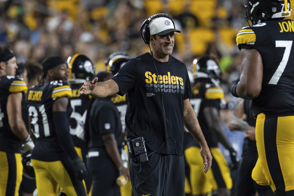 FILE - Pittsburgh Steelers quarterback Aaron Rodgers (8) reacts during a preseason NFL football game, Saturday, Aug. 16, 2025, in Pittsburgh. (AP Photo/Matt Durisko, File)