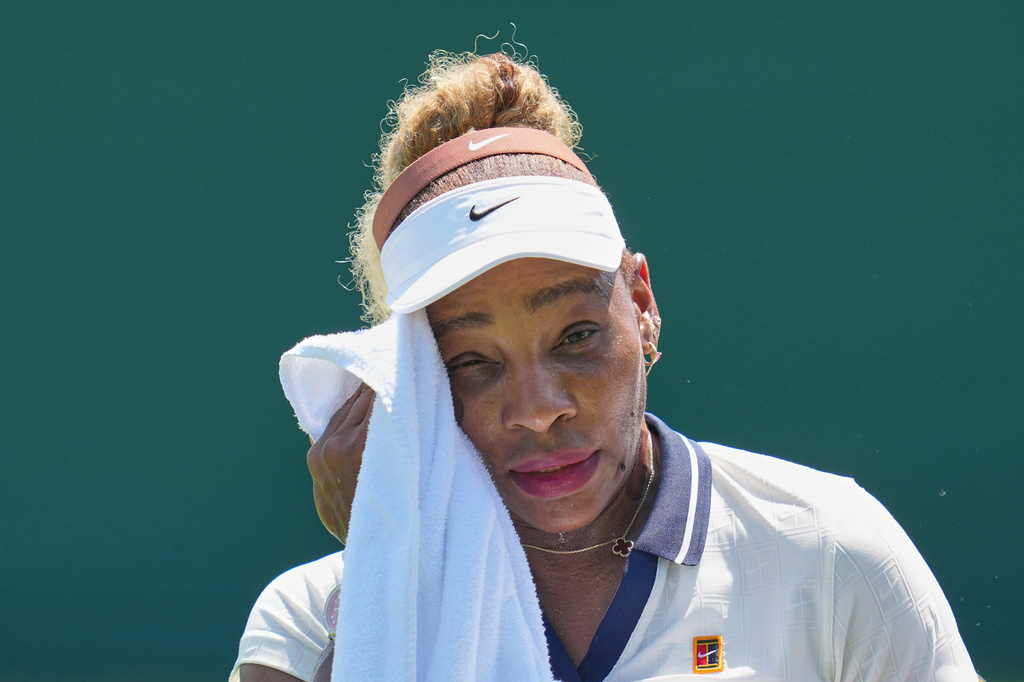Serena Williams of the United States wipes sweat during a practice session ahead of the Wimbledon Tennis Championships, in London, Wednesday, June 24, 2026. (AP Photo/Kin Cheung)
