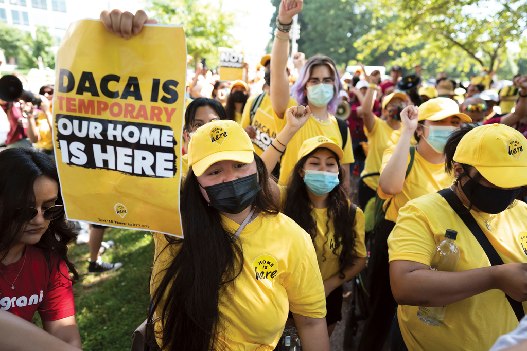 FILE - Susana Lujano, left, a dreamer from Mexico who lives in Houston, joins other activists to rally in support of the Deferred Action for Childhood Arrivals program, also known as DACA, at the U.S. Capitol in Washington on June 15, 2022. (AP Photo/J. Scott Applewhite, File)
