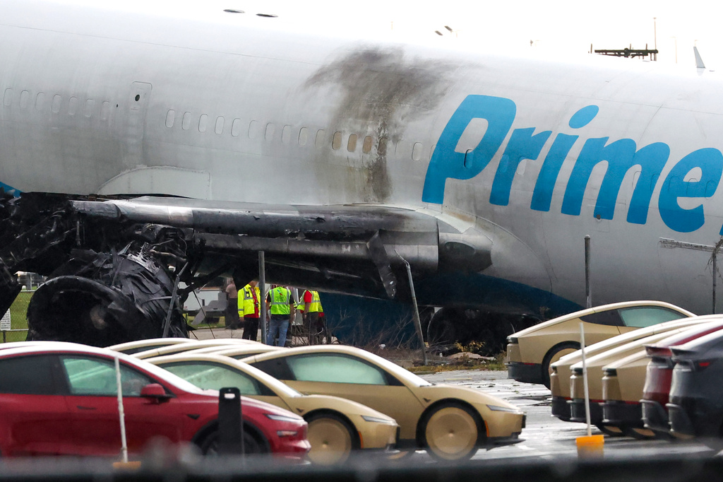 An Amazon cargo plane sits at Miami International Airport after overshooting a runway on Monday, Sept. 7, 2026, in Miami. (AP Photo/David Santiago)