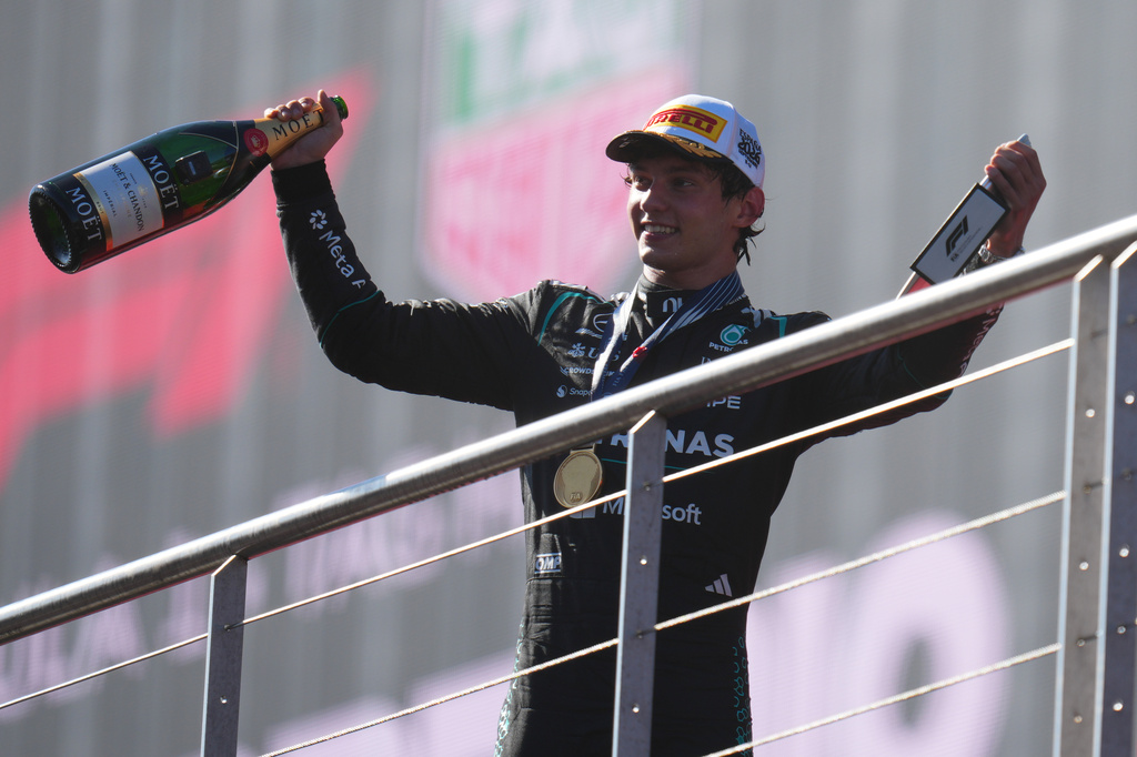Mercedes driver Andrea Kimi Antonelli of Italy celebrates on the podium after winning the Spanish Formula One Grand Prix race in Madrid, Sunday, Sept. 13, 2026. (AP Photo/Manu Fernandez)