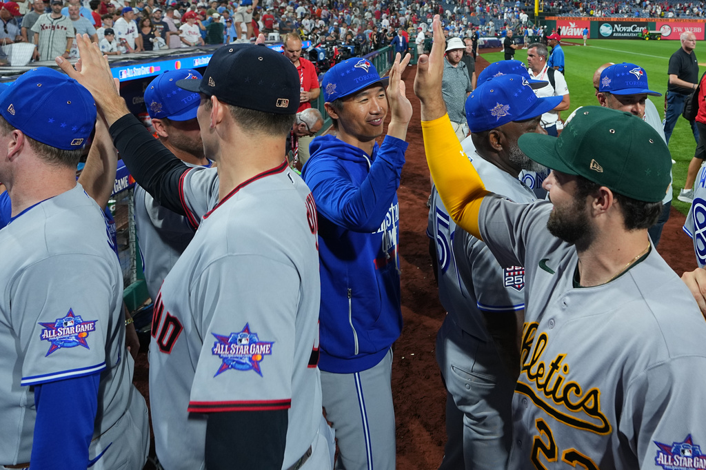 American League players celebrate after they beat the National League in the MLB baseball All-Star Game, Tuesday, July 14, 2026, in Philadelphia. (AP Photo/Matt Rourke)