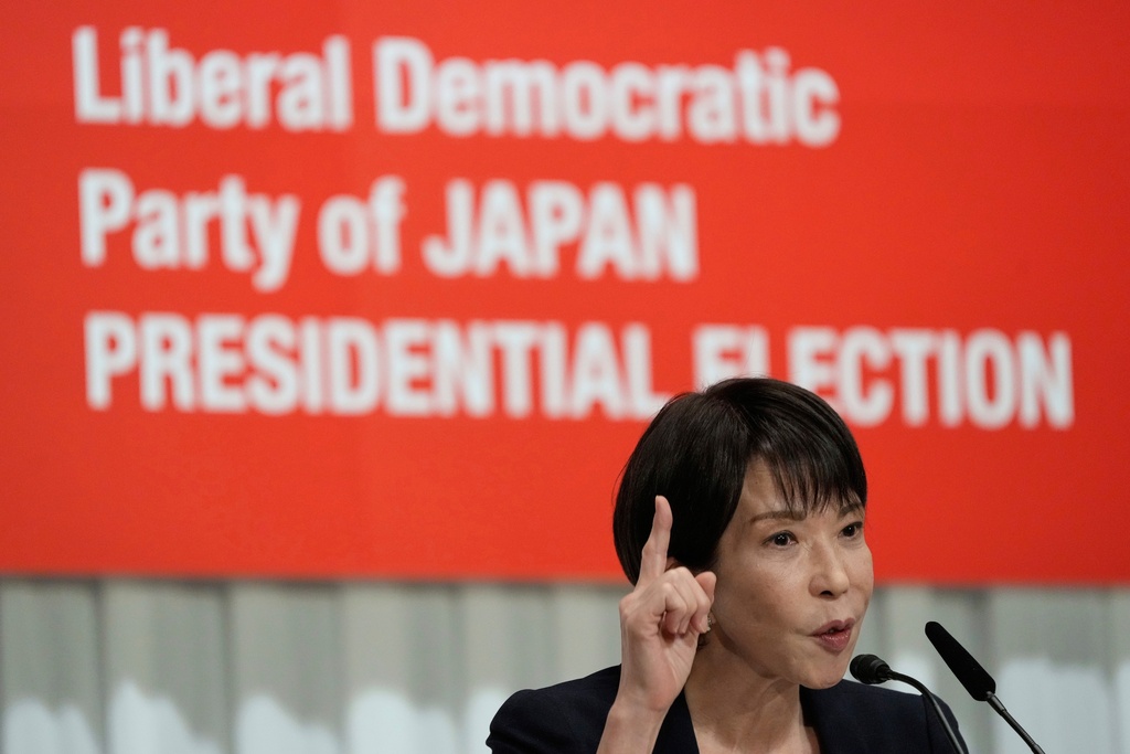 FILE - Japan's former Economic Security Minister Sanae Takaichi answers questions during a joint press conference by the Liberal Democratic Party (LDP) presidential election candidates at the party's headquarters, Sept. 23, 2025, in Tokyo. (AP Photo/Eugene Hoshiko, Pool, File)