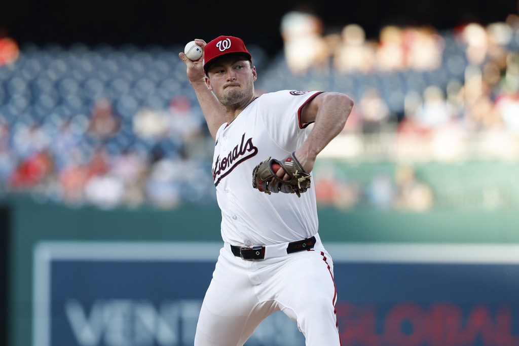 Washington Nationals pitcher Brad Lord throws during the first inning of a baseball game against the Philadelphia Phillies, Thursday, Aug. 14, 2025, in Washington. (AP Photo/Terrance Williams)