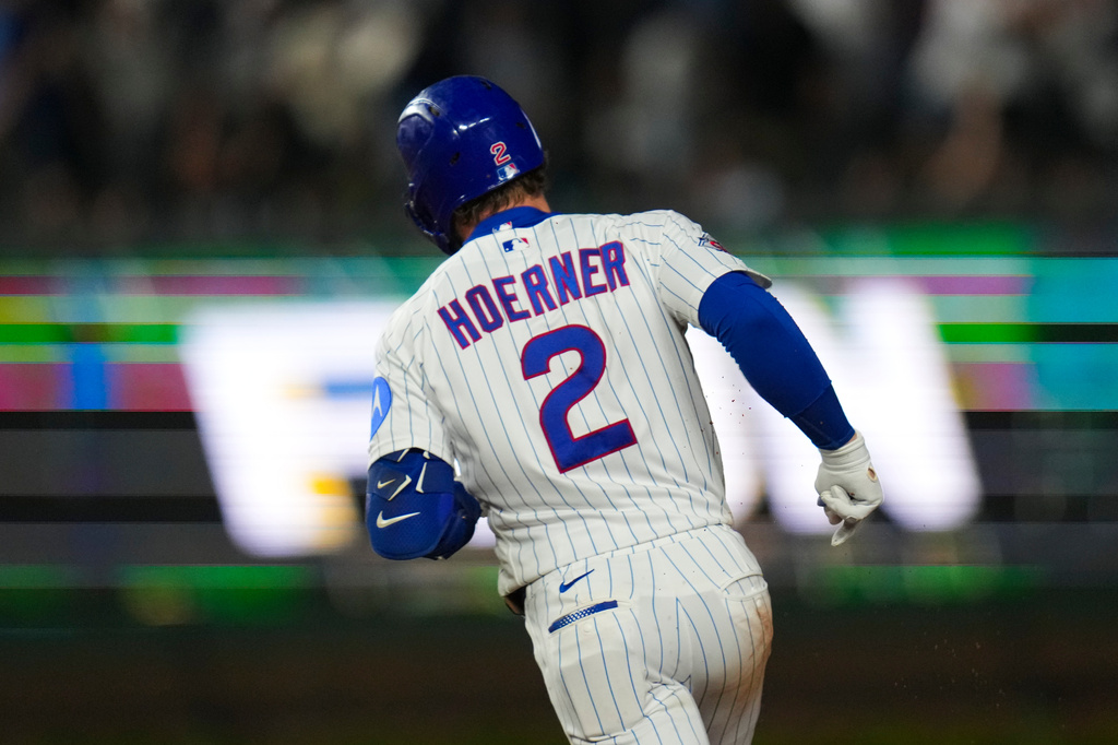 Chicago Cubs' Nico Hoerner (2) runs the bases after hitting a home run during the seventh inning of a baseball game against the Philadelphia Phillies, Tuesday, April 21, 2026, in Chicago. (AP Photo/Erin Hooley)