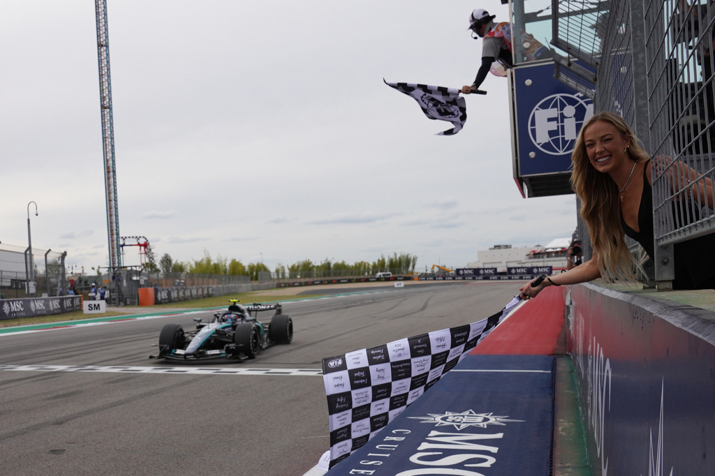 Mercedes driver Andrea Kimi Antonelli of Italy crosses the finish line to win the Formula One U.S. Grand Prix auto race in Austin, Texas, Sunday, Oct. 25, 2026. (Dustin Safranek/Pool Photo via AP)
