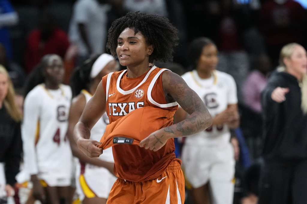 Texas guard Rori Harmon (3) celebrates the team's win over South Carolina in an NCAA college basketball game in the Players Era tournament in Las Vegas, Thursday, Nov. 27, 2025. (AP Photo/Eric Gay)