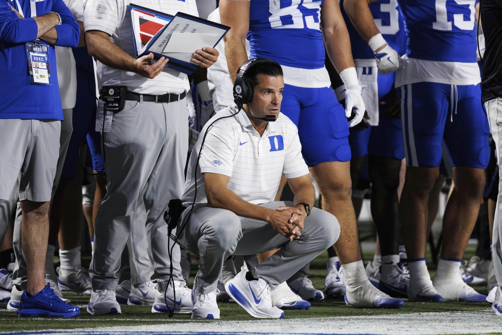 Duke head coach Manny Diaz looks towards the field during the first half of an NCAA college football game against Elon in Durham, N.C., Thursday, Aug. 28, 2025. (AP Photo/Ben McKeown)