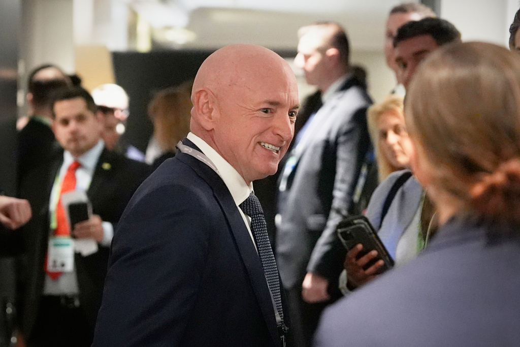 Sen. Mark Kelly, D-Ariz. arrives before a meeting between U.S. Secretary of State Marco Rubio and Syrian Foreign Minister Asaad al-Shibani in Munich, Germany, Friday, Feb. 13, 2026, on the sidelines of the Munich Security Conference. (AP Photo/Alex Brandon, Pool)