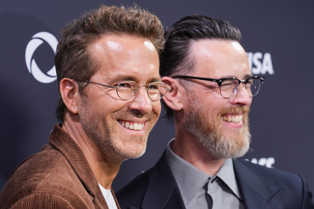 Ryan Reynolds, left, and director Colin Hanks attend the premiere of "John Candy: I Like Me" during the Toronto International Film Festival on Thursday, Sept. 4, 2025, at Roy Thomson Hall in Toronto. (AP Photo/Chris Pizzello)