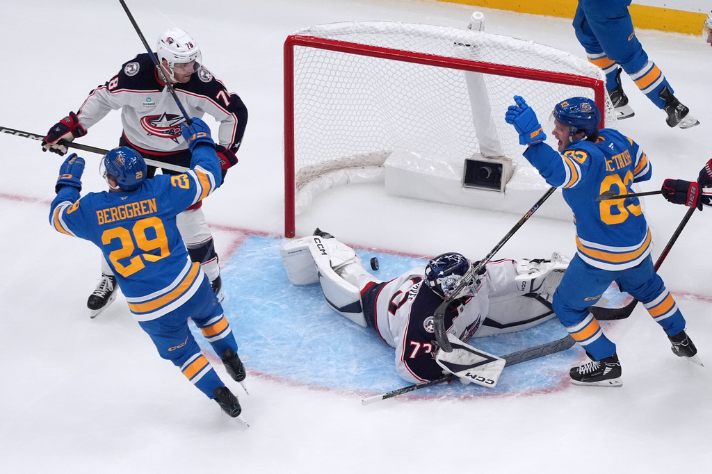 St. Louis Blues' Jonatan Berggren (29) celebrates after scoring past Columbus Blue Jackets goaltender Jet Greaves (73) during the third period of an NHL hockey game Saturday, Oct. 10, 2026, in St. Louis. (AP Photo/Jeff Roberson)