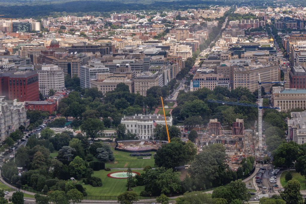 Construction continues on a helipad and the White House Ballroom on the South Lawn of the White House, Wednesday, Aug. 5, 2026, in Washington. (AP Photo/Tierney L. Cross)