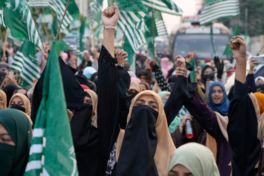 Supporters of ' Muslim women league Pakistan, hold a rally to mark the anniversary of last year's four-day conflict with neighboring India, Thursday, May 7, 2026, in Lahore, Pakistan. (AP Photo/K.M. Chaudary)