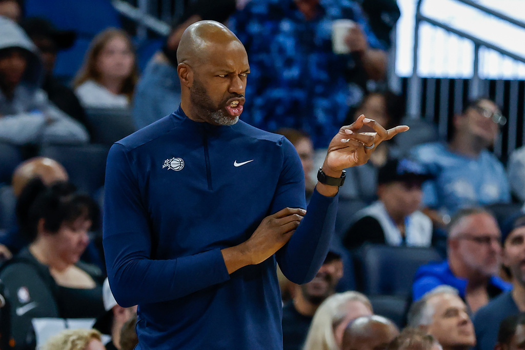 Orlando Magic head coach Jamahl Mosley reacts to his team as they play against the Miami Heat during the first half of a preseason NBA basketball game, Sunday, Oct. 12, 2025, in Orlando, Fla. (AP Photo/Kevin Kolczynski)
