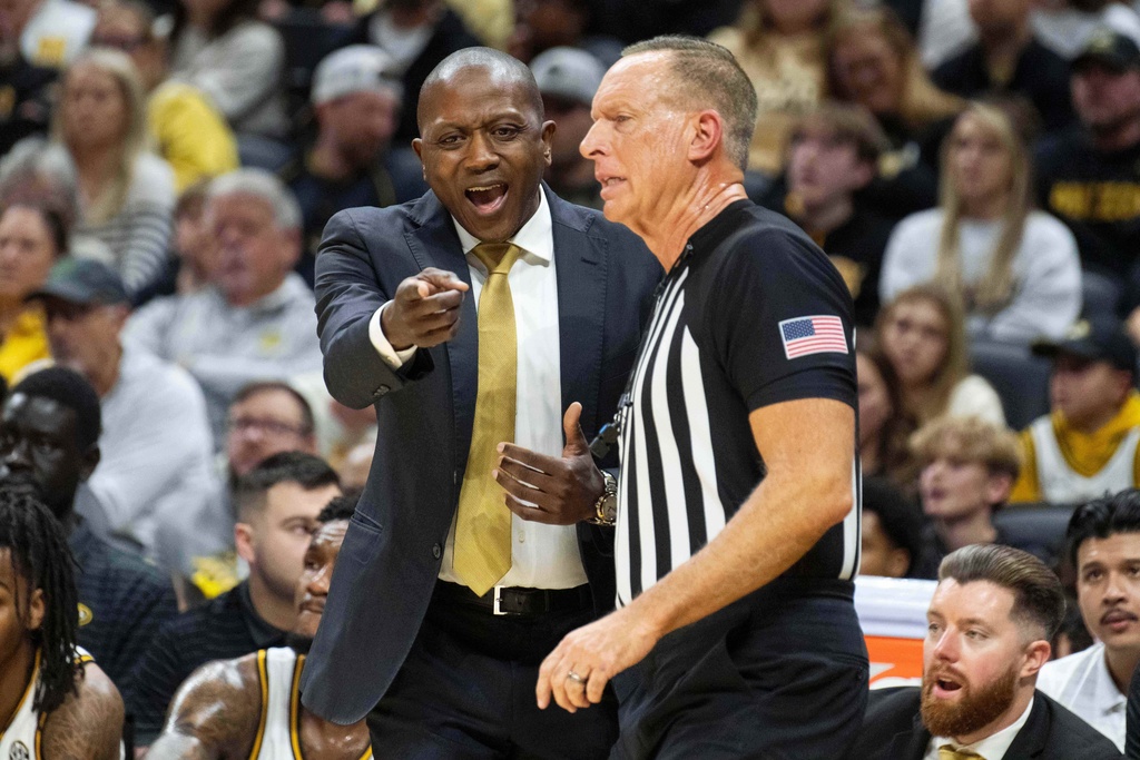 Missouri head coach Dennis Gates argues a call during the first half of an NCAA basketball game against Florida, Saturday, Jan. 3, 2026, in Columbia, Mo. (AP Photo/L.G. Patterson)