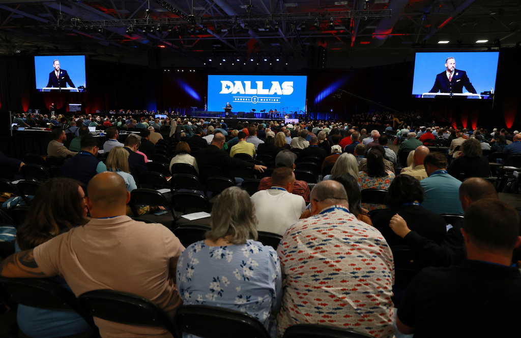 FILE - Messengers attending the Southern Baptist Convention listen to remarks by president Clint Pressley during the 2025 SBC Annual Meeting, June 10, 2025, in Dallas. (AP Photo/Richard W. Rodriguez, File)