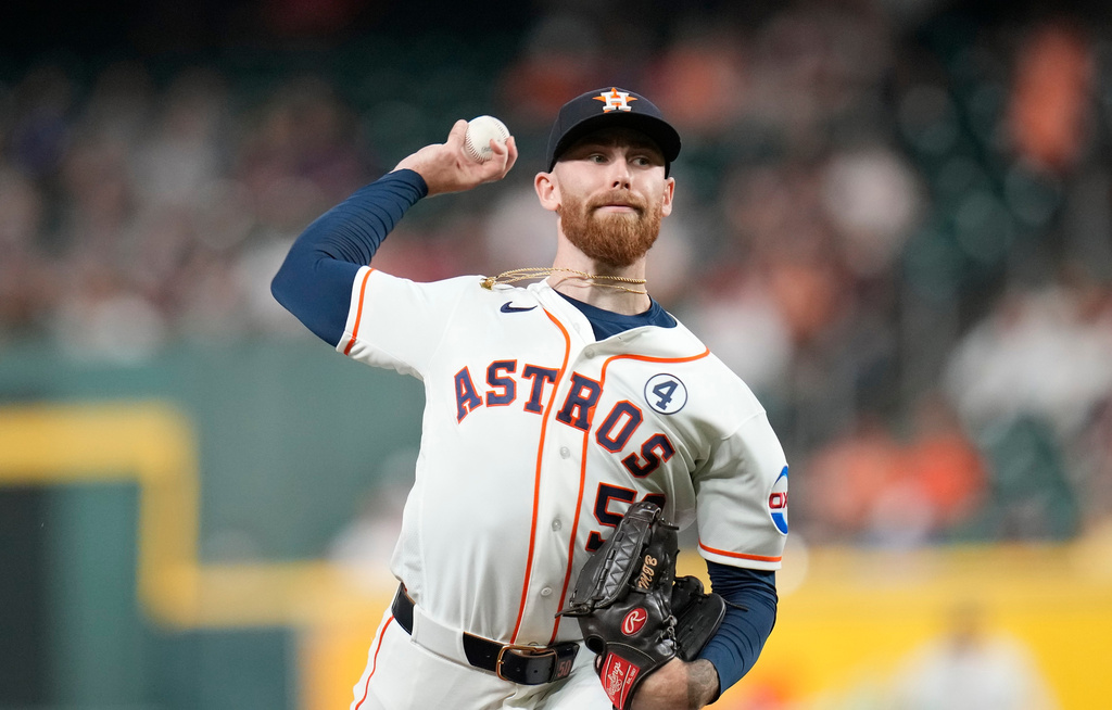 Houston Astros starting pitcher Mike Burrows delivers to Pittsburgh Pirates' Spencer Horwitz during the first inning of a baseball game, Tuesday, June 2, 2026, in Houston. (AP Photo/Karen Warren)